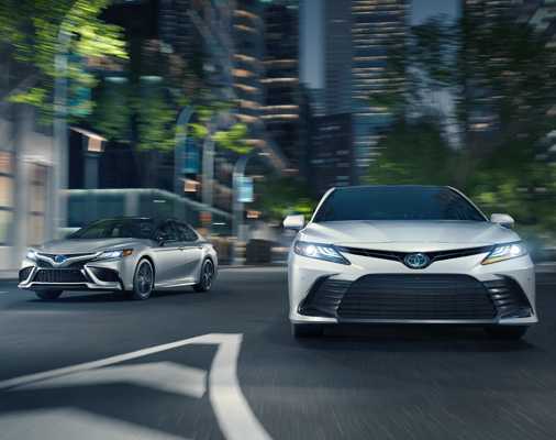 Camry Hybrid XSE shown in Celestial Silver Metallic with Black Roof and Camry Hybrid XLE shown in Wind Chill Pearl