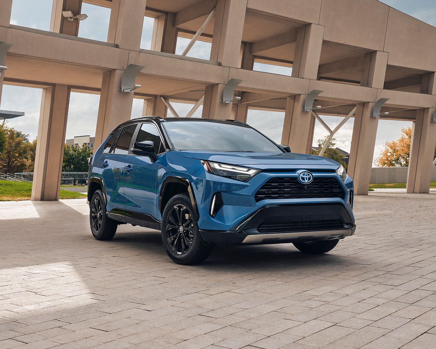 RAV4 Hybrid XSE shown in Cavalry Blue with Black Roof