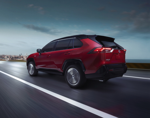 RAV4 Prime XSE shown in Supersonic Red with Black Roof