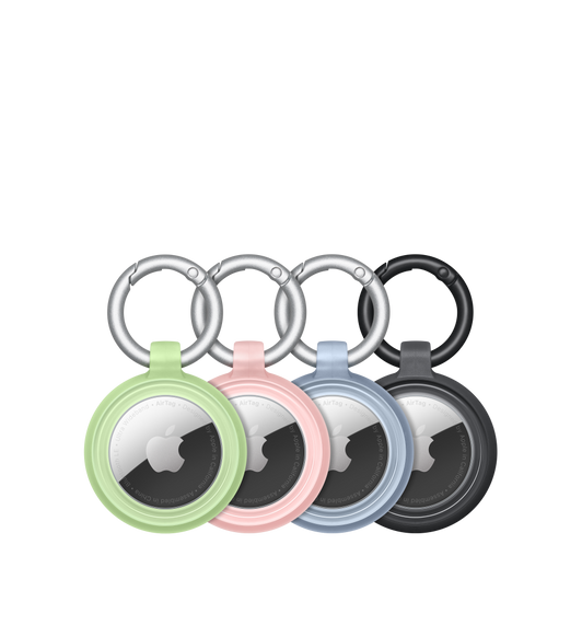 4つのOtterBox Lumen Series Case。色はグリーン、ピンク、ブルー、ブラック。それぞれにAirTagがしっかりとはめ込まれ、中央にAppleのロゴが見えている。
