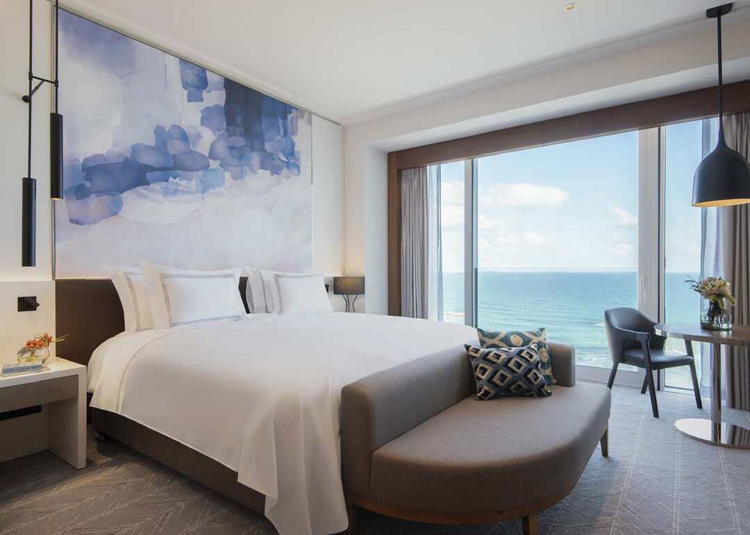 Each of the 250 elegant rooms and suites has expansive views of either the lively city or glistening sea.