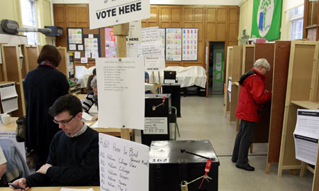 People prepare to vote at a polling station in North Dublin, Ireland.
