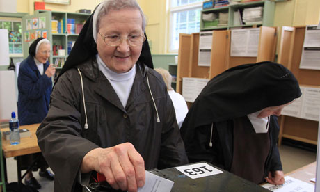 A Catholic nun casts her vote at the Drumcondra polling station in Dublin.
