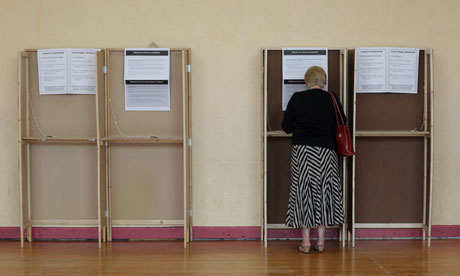 A voter marks her ballot in the referendum on the European fiscal treaty in Dublin.