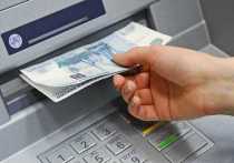 Российский лидер Владимир Путин подписал закон об обязательном контроле операций по снятию в Российской Федерации наличных денег с карт зарубежных банков