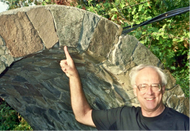 Marine ecologist Robert T. Paine points to the keystone block of an arch. He conceived of “keystone species” in ecosystems in 1969.