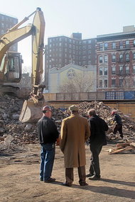 At the demolition site.